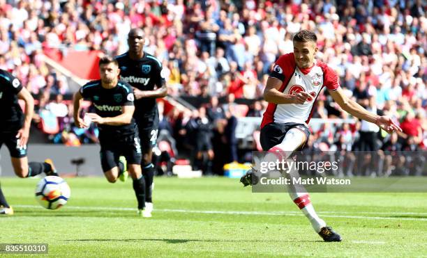 Southampton's Dusan Tadic scores from the penalty spot during the Premier League match between Southampton and West Ham United at St Mary's Stadium...