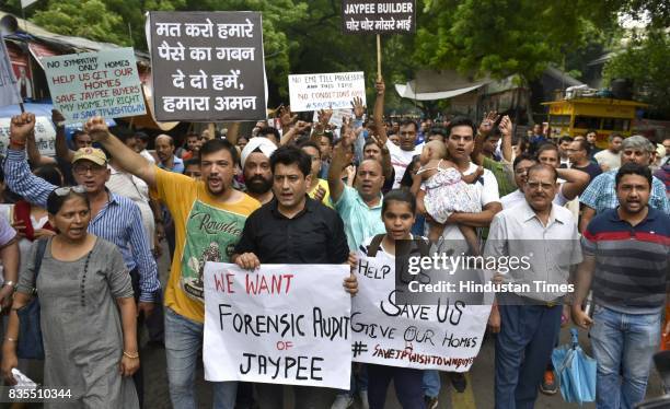 Scores of home buyers of Jaypee Infratech affected by delayed possessions stage a protest at Jantar Mantar on Saturday and threaten to commit suicide...