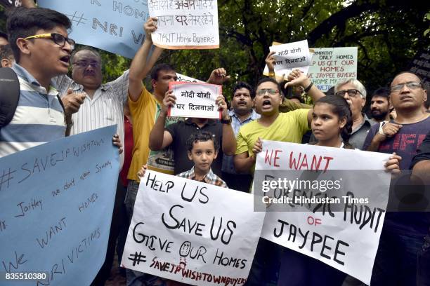 Scores of home buyers of Jaypee Infratech affected by delayed possessions stage a protest at Jantar Mantar on Saturday and threaten to commit suicide...