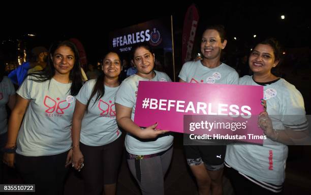 Women participate in Colors Pinkathon Delhi, 'Fearless Midnight Women's run', along with Delhi Police as one of the participants, organised at Inner...