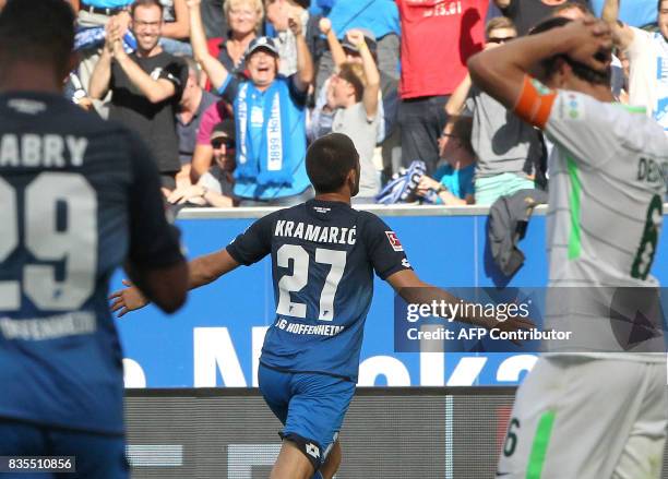 Hoffenheim's Croatian forward Andrej Kramaric celebrates scoring the 1-0 during the German First division Bundesliga football match TSG 1899...