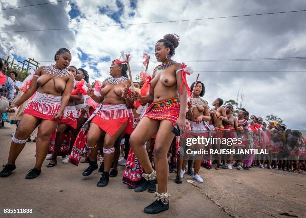 Traditionally clad Zulu maidens take part in the mini reed dance in the rural district of Emalangeni, some 80kms north of Durban on August 19, 2017.