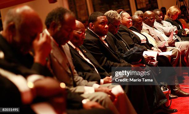 People attend a Southern Christian Leadership Conference rally in the historic Sixteenth Street Baptist Church where speakers encouraged people to...