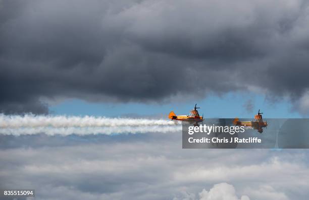 The Brietling Wingwalkers during a flying display at the Biggin Hill Festival of Flight on August 19, 2017 in Biggin Hill, England. The Biggin Hill...