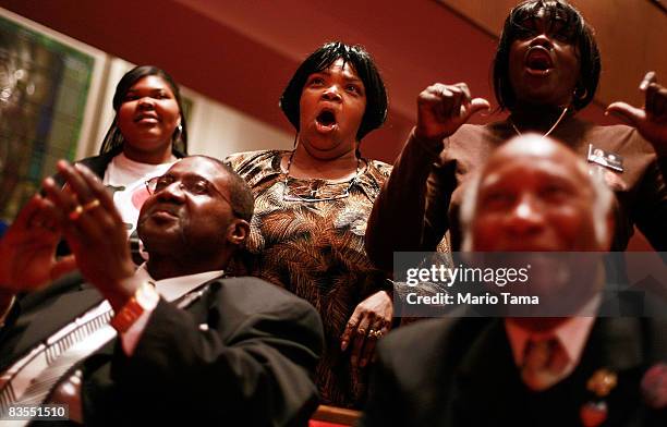 People applaud during a Southern Christian Leadership Conference rally in the historic Sixteenth Street Baptist Church where speakers encouraged...