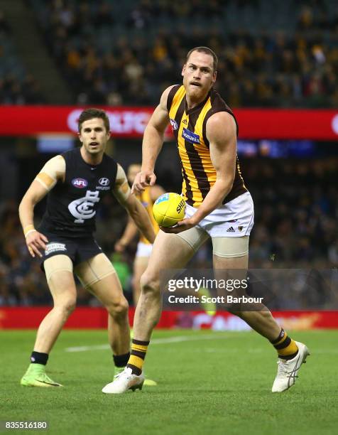 Jarryd Roughead of the Hawks runs with the ball during the round 22 AFL match between the Carlton Blues and the Hawthorn Hawks at Etihad Stadium on...