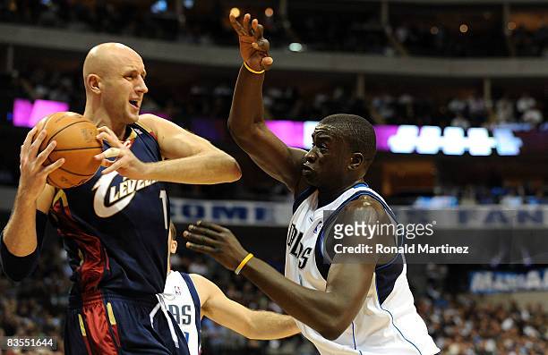 Center Zydrunas Ilgauskas of the Cleveland Cavaliers moves the ball against DeSagana Diop of the Dallas Mavericks on November 3, 2008 at American...