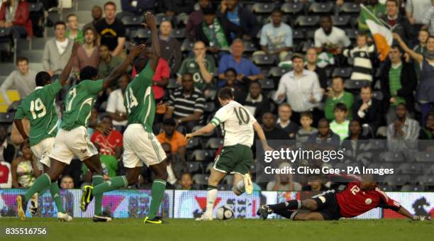 Republic of Ireland's Robbie Keane rounds Nigeria's Austin Ejide to score Ireland's first goal during the Friendly match at Craven Cottage, London.