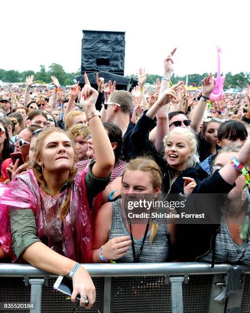 Festival goers enjoy V Festival 2017 at Weston Park on August 19, 2017 in Stafford, England.