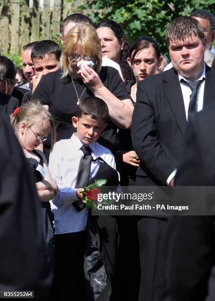 Evelyn McDaid with her family, including son Ryan at the funeral of her husband Kevin McDaid, Coleraine Co Londonderry.