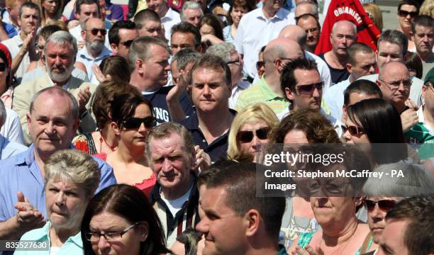 Protesters during a rally at the City Hall in Belfast today.