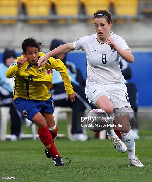 Sarah McLaughlin of New Zealand is closed down by Edna Mendez of Colombia during the FIFA U-17 Women's World Cup match between New Zealand and...