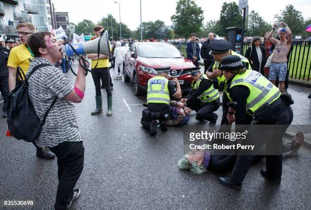 Police arrest people protesting that the police were allowed to leadthe march at Glasgow Pride on August 19, 2017 in Glasgow, Scotland. The largest...