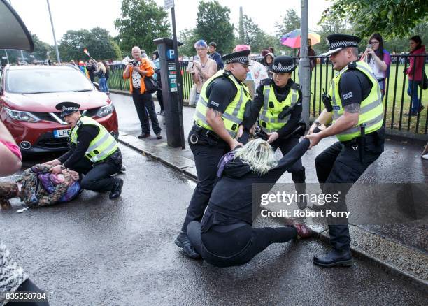 Police arrest people protesting that the police were allowed to leadthe march at Glasgow Pride on August 19, 2017 in Glasgow, Scotland. The largest...