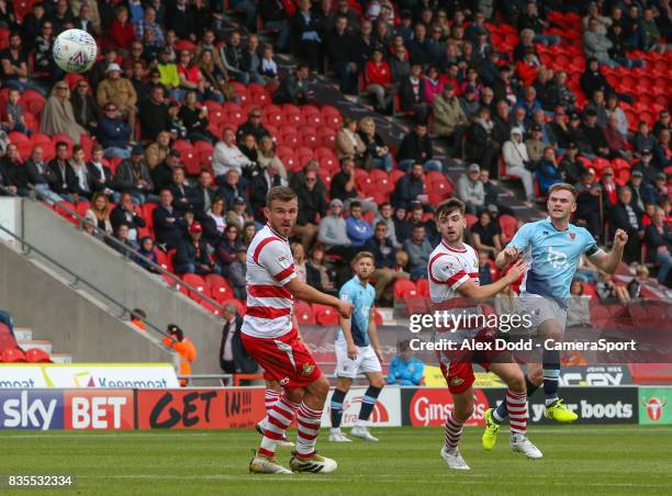 Blackpool's Oliver Turton scores his sides equalising goal to make the score 2-2 during the Sky Bet League One match between Doncaster Rovers and...