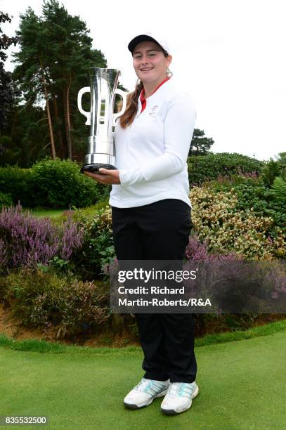 Lily May Humphreys of England poses with the trophy following her victory during the final of the Girls' British Open Amateur Championship at Enville...