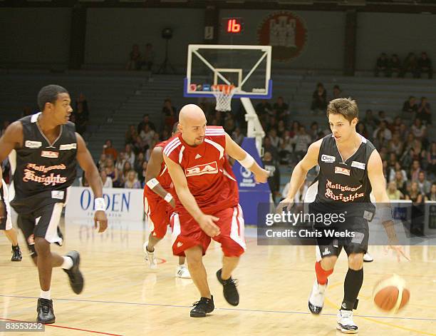 Actors Wesley Johnathan and Joshua Henderson participates in the charity basketball game as part of the Hollywood Knights Norway Tour on August 14,...