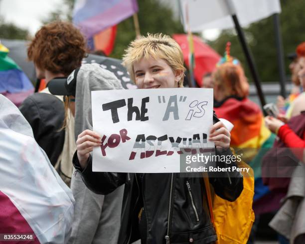 Participant holds a sign that says "The "A" is for asexual" during the Glasgow Pride march on August 19, 2017 in Glasgow, Scotland. The largest...