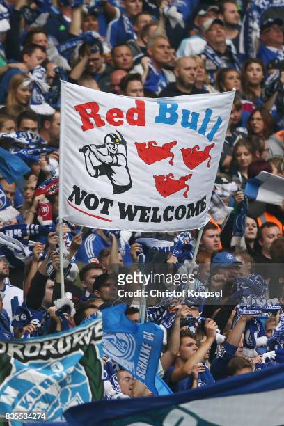 Fans of Schalke show their disrespect over Red Bull and RB Leipzig during the Bundesliga match between FC Schalke 04 and RB Leipzig at Veltins-Arena...