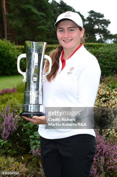 Lily May Humphreys of England poses with the trophy following her victory during the final of the Girls' British Open Amateur Championship at Enville...