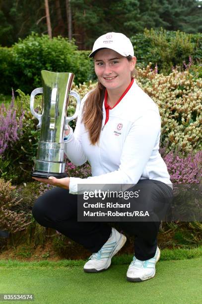 Lily May Humphreys of England poses with the trophy following her victory during the final of the Girls' British Open Amateur Championship at Enville...