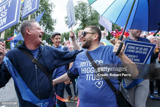 Participants embrace during the Glasgow Pride march on August 19, 2017 in Glasgow, Scotland. The largest festival of LGBTI celebration in Scotland...