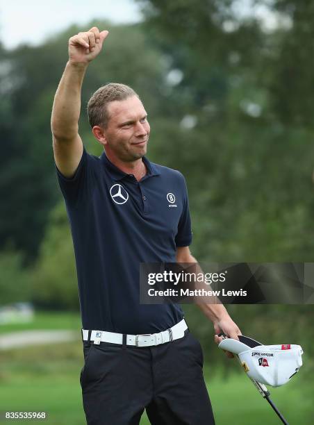 Marcel Siem of Germany celebrates his win against Robert Rock during day three of the Saltire Energy Paul Lawrie Matchplay at Golf Resort Bad...