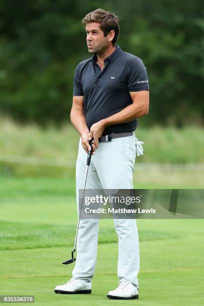 Robert Rock of England reacts to a putt on the 17th green during day three of the Saltire Energy Paul Lawrie Matchplay at Golf Resort Bad Griesbach...