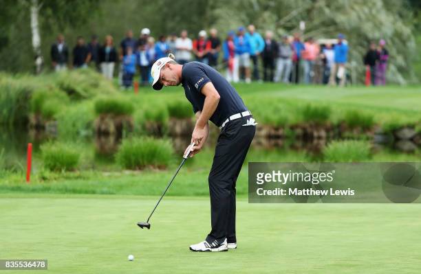 Marcel Siem of Germany makes a putt on the 18th green during day three of the Saltire Energy Paul Lawrie Matchplay at Golf Resort Bad Griesbach on...