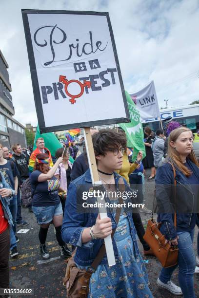 Participant carries a sign during the Glasgow Pride march on August 19, 2017 in Glasgow, Scotland. The largest festival of LGBTI celebration in...