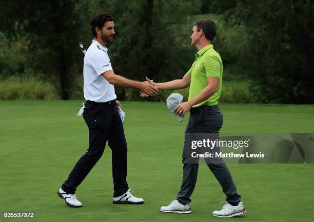 Chris Paisley of England congratulates Alejandro Canizares of Spain on his win during day three of the Saltire Energy Paul Lawrie Matchplay at Golf...