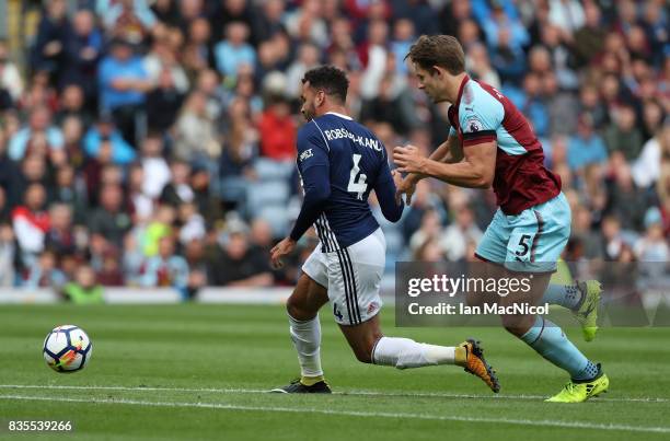 Hal Robson-Kanu of West Bromwich Albion evades James Tarkowski of Burnley and scores the only goal of the game during the Premier League match...