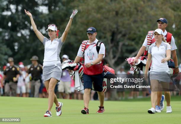 Paula Creamer and Austin Ernst of the United States Team walk down the 15th hole in their match against Melissa Reid and Emily Pedersen of the...