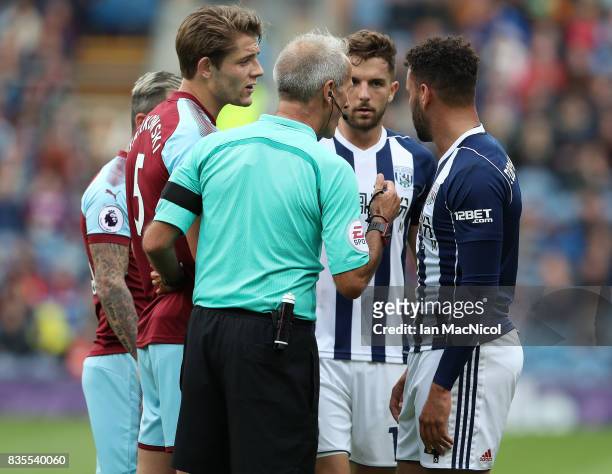Hal Robson-Kanu of West Bromwich Albion is sent of by referee Martin Atkinson during the Premier League match between Burnley and West Bromwich...