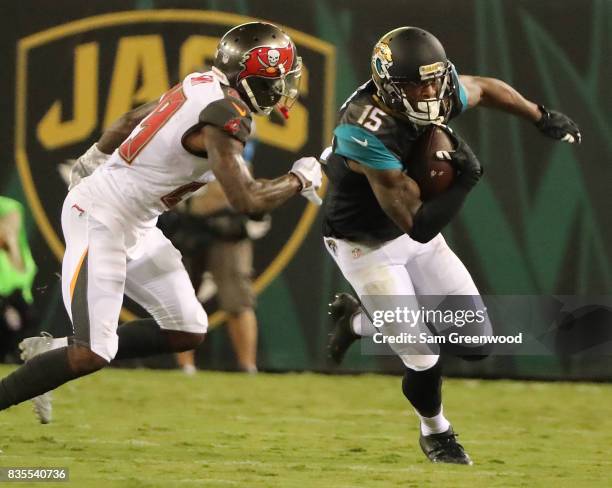 Allen Robinson of the Jacksonville Jaguars attempts to run past Ryan Smith of the Tampa Bay Buccaneers during a preseason game at EverBank Field on...