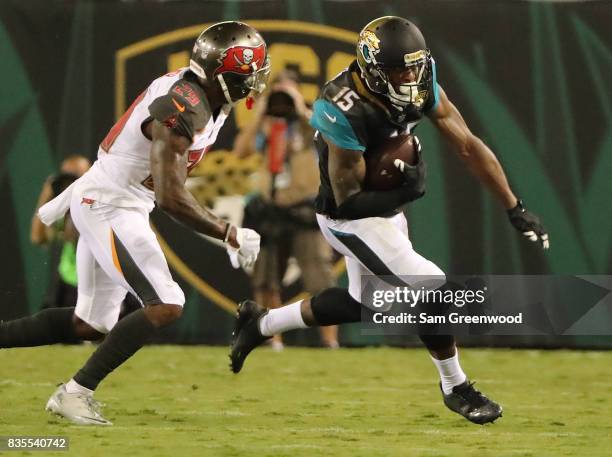 Allen Robinson of the Jacksonville Jaguars attempts to run past Ryan Smith of the Tampa Bay Buccaneers during a preseason game at EverBank Field on...