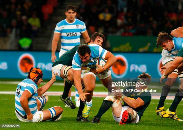 Argentina's captain and hooker Agustin Creevy is tackled during the International Rugby Championship Test match between Argentina and South Africa at...