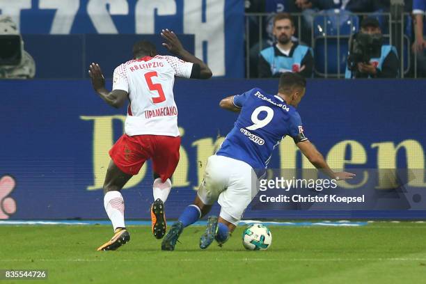 Franco Di Santo of Schalke is being fault by Dayot Upamecano of Leipzig which results in a penalty for Schalke during the Bundesliga match between FC...