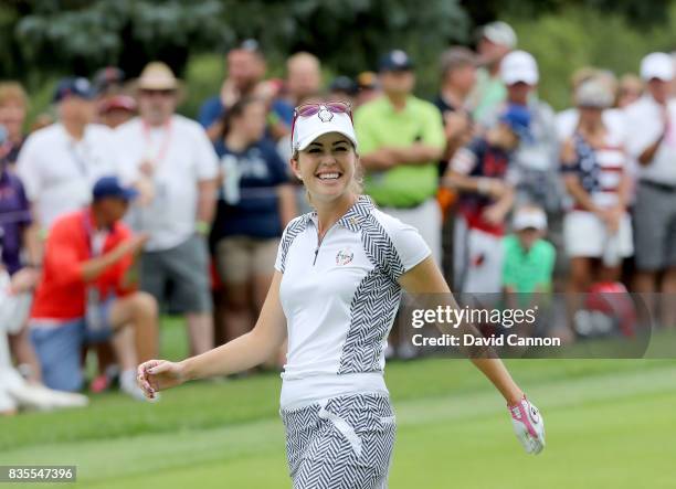 Paula Creamer of the United States Team walks down the 15th hole in her match with Austin Ernst against Melissa Reid and Emily Pedersen of the...