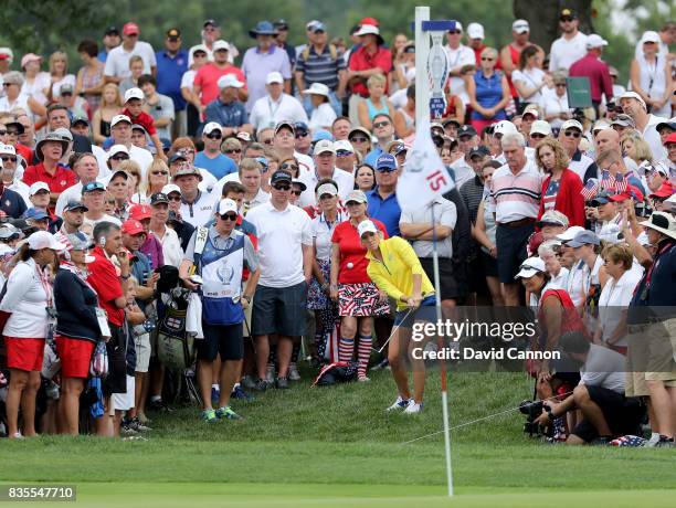 Melissa Reid of England and the European Team plays her third shot on the 15th hole in her match with Emily Pedersen against Paula Creamer and Austin...