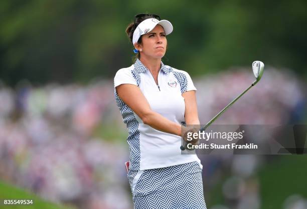 Gerina Piller of Team USA plays a shot during the second day morning foursomes matches of The Solheim Cup at Des Moines Golf and Country Club on...