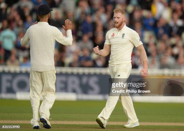 Ben Stokes of England is congratulated after dismissing Shai Hope of the West Indies during the third day of the 1st Investec Test match between...