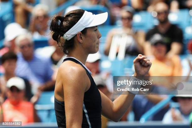 Garbine Muguruza of Spain celebrates after defeating Karolina Pliskova of Czech Republic during Day 8 of the Western and Southern Open at the Linder...