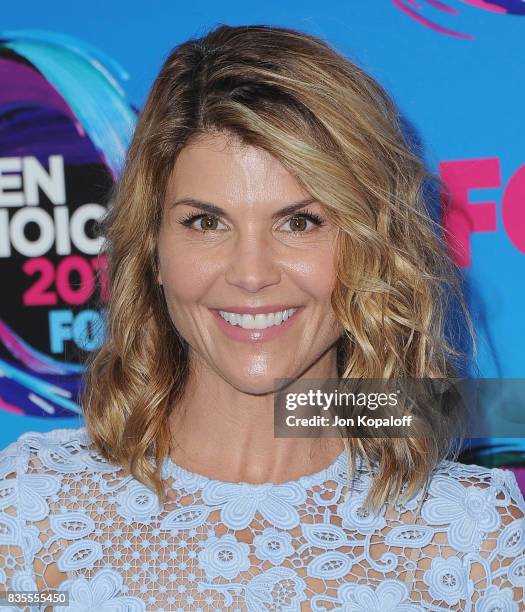 Actress Lori Loughlin arrives at the Teen Choice Awards 2017 at Galen Center on August 13, 2017 in Los Angeles, California.