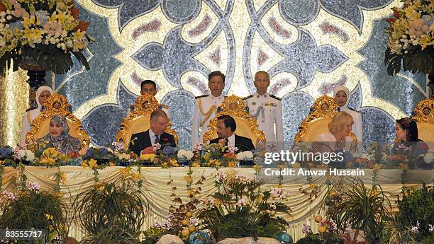 Prince Charles, Prince of Wales and Camilla, Duchess of Cornwall sit with Sultan Hassanal Bolkiah and his wives, Queen Hajah Saleha and Arinaz Mazhar...