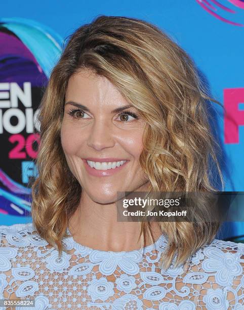 Actress Lori Loughlin arrives at the Teen Choice Awards 2017 at Galen Center on August 13, 2017 in Los Angeles, California.