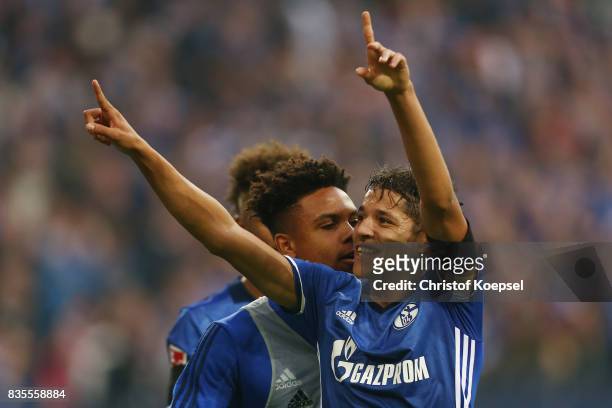 Amine Harit of Schalke celebrates Schalke's second goal during the Bundesliga match between FC Schalke 04 and RB Leipzig at Veltins-Arena on August...