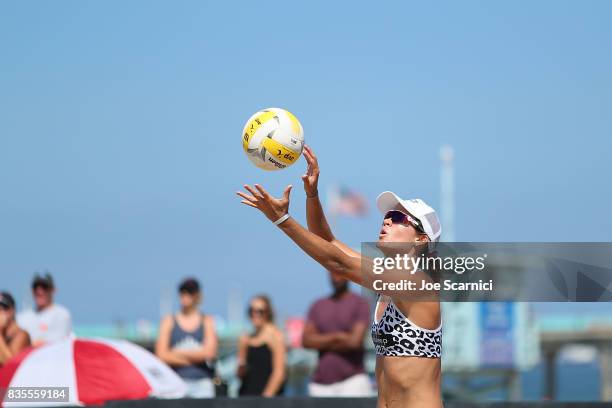 Angela Bensend serves the ball during her round 4 match at the AVP Manhattan Beach Open - Day 3 on August 19, 2017 in Manhattan Beach, California.