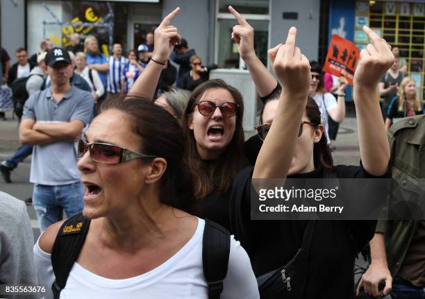 Left-wing activists protest against Neo-Nazis at an extreme right-wing demonstration commemorating the 30th anniversary of the death of Nazi leader...
