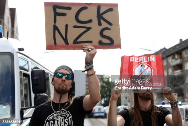 Left-wing activists protest against Neo-Nazis at an extreme right-wing demonstration commemorating the 30th anniversary of the death of Nazi leader...